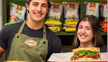 Toscano Edinburgh co-founders Yaya and Valentino behind the counter with freshly made Italian schiacciata sandwiches.