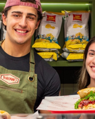 Toscano Edinburgh co-founders Yaya and Valentino behind the counter with freshly made Italian schiacciata sandwiches.